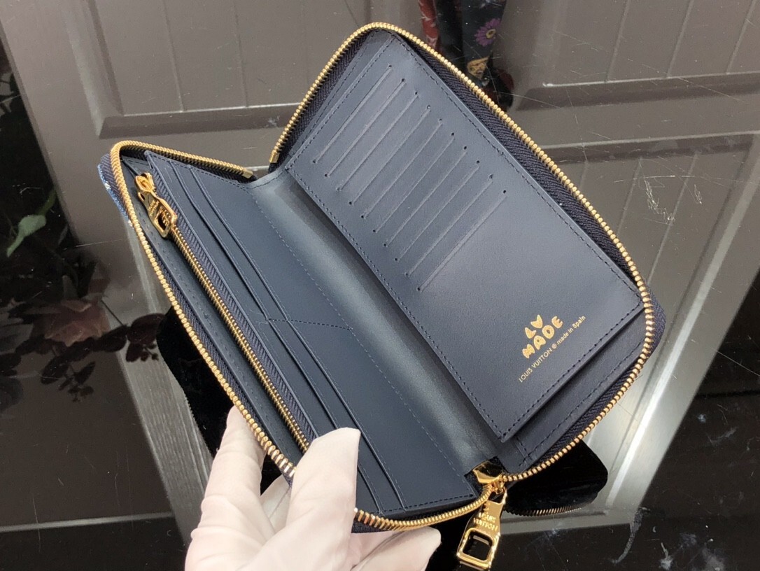 LV ZIPPY VERTICAL wallet M63095PZ 