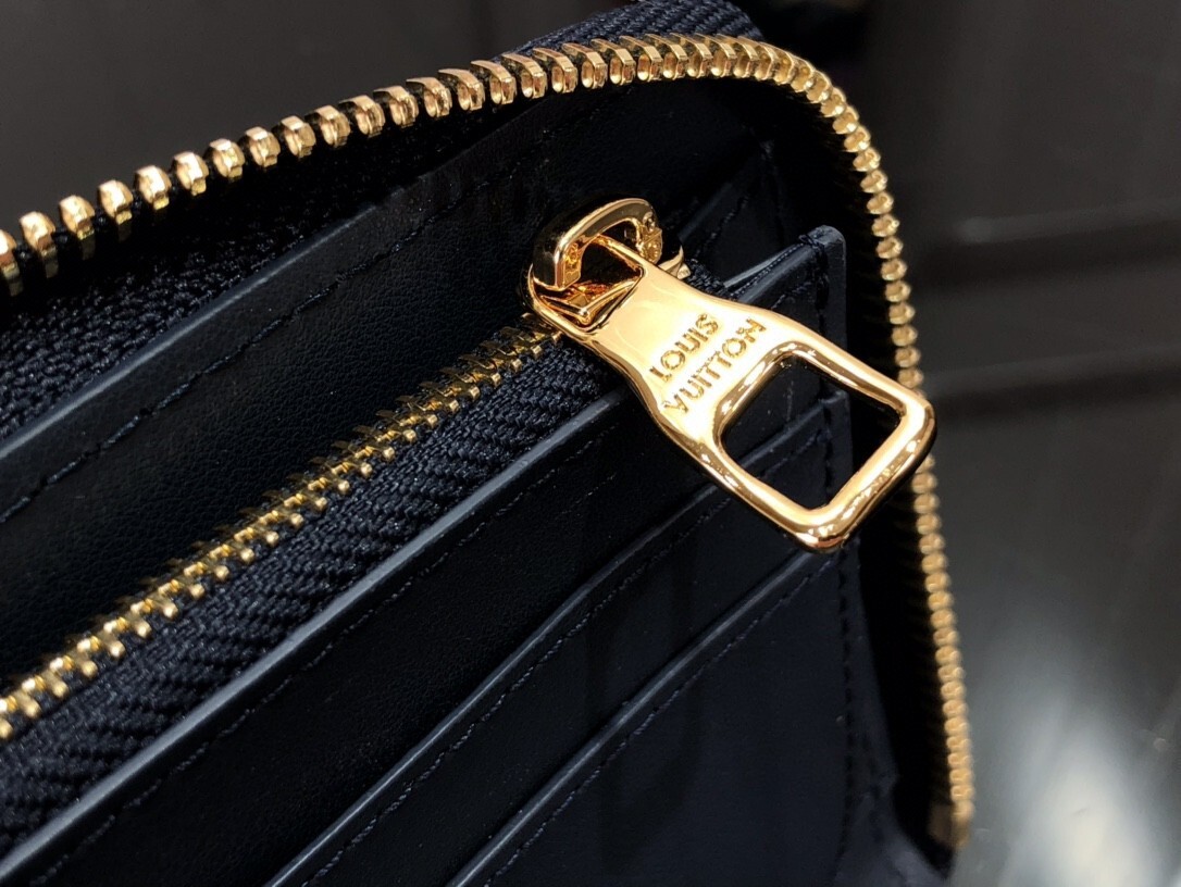 LV ZIPPY VERTICAL wallet M63095PZ 