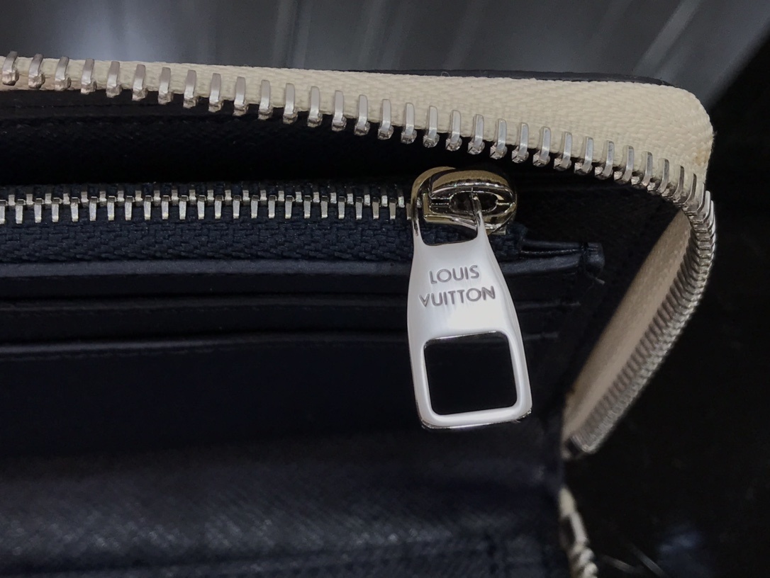 LV ZIPPY VERTICAL wallet M80499 