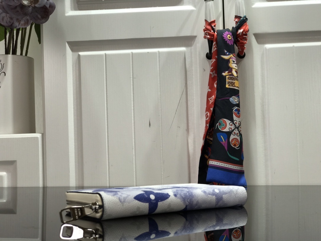 LV ZIPPY VERTICAL wallet M80499 